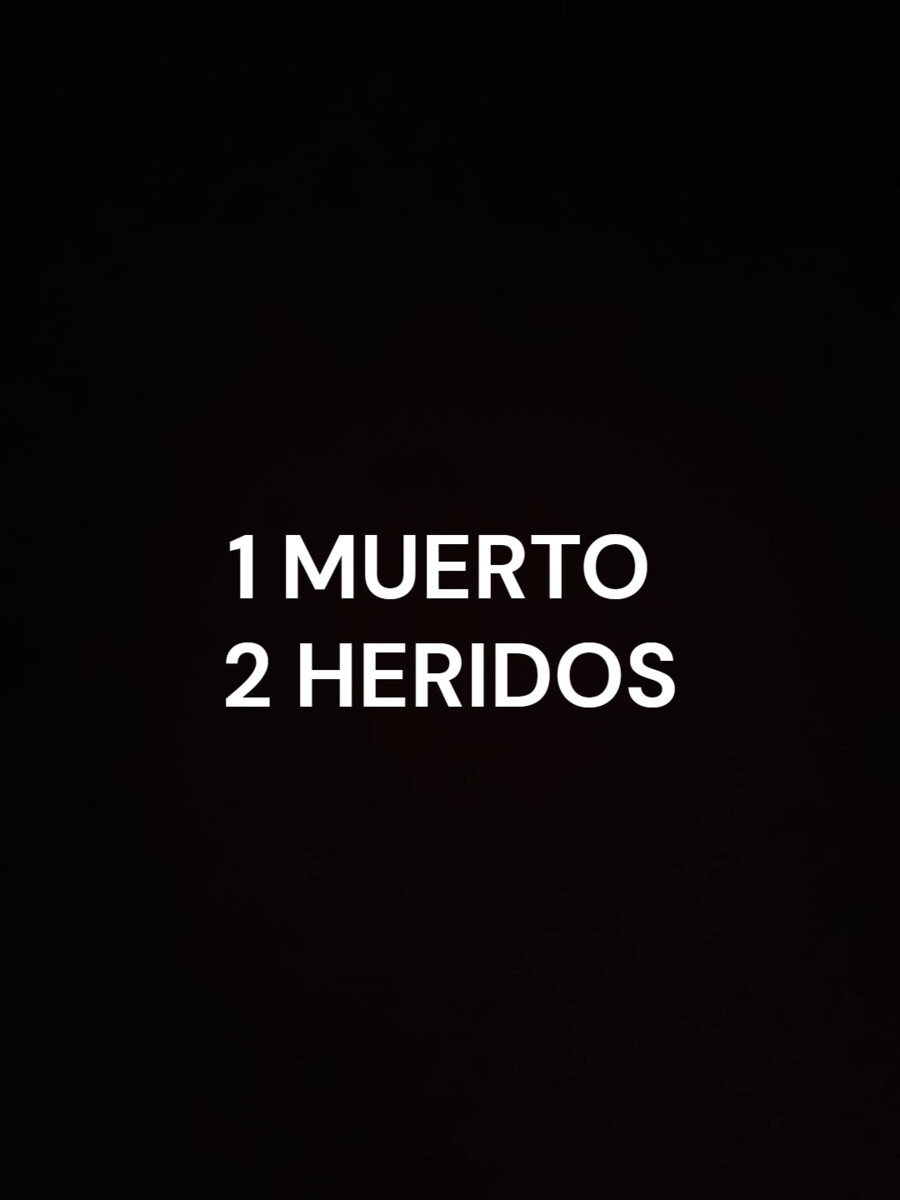 Texto un muerto y dos heridos sobre fondo oscuro